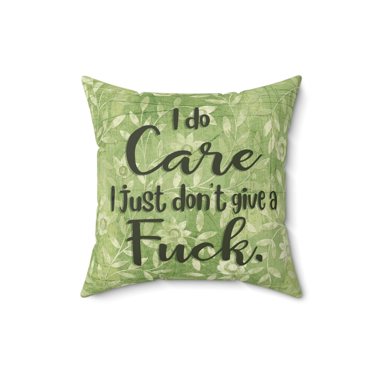 Sassy throw pillow that states: I don't give a Fuck pillow on green floral background