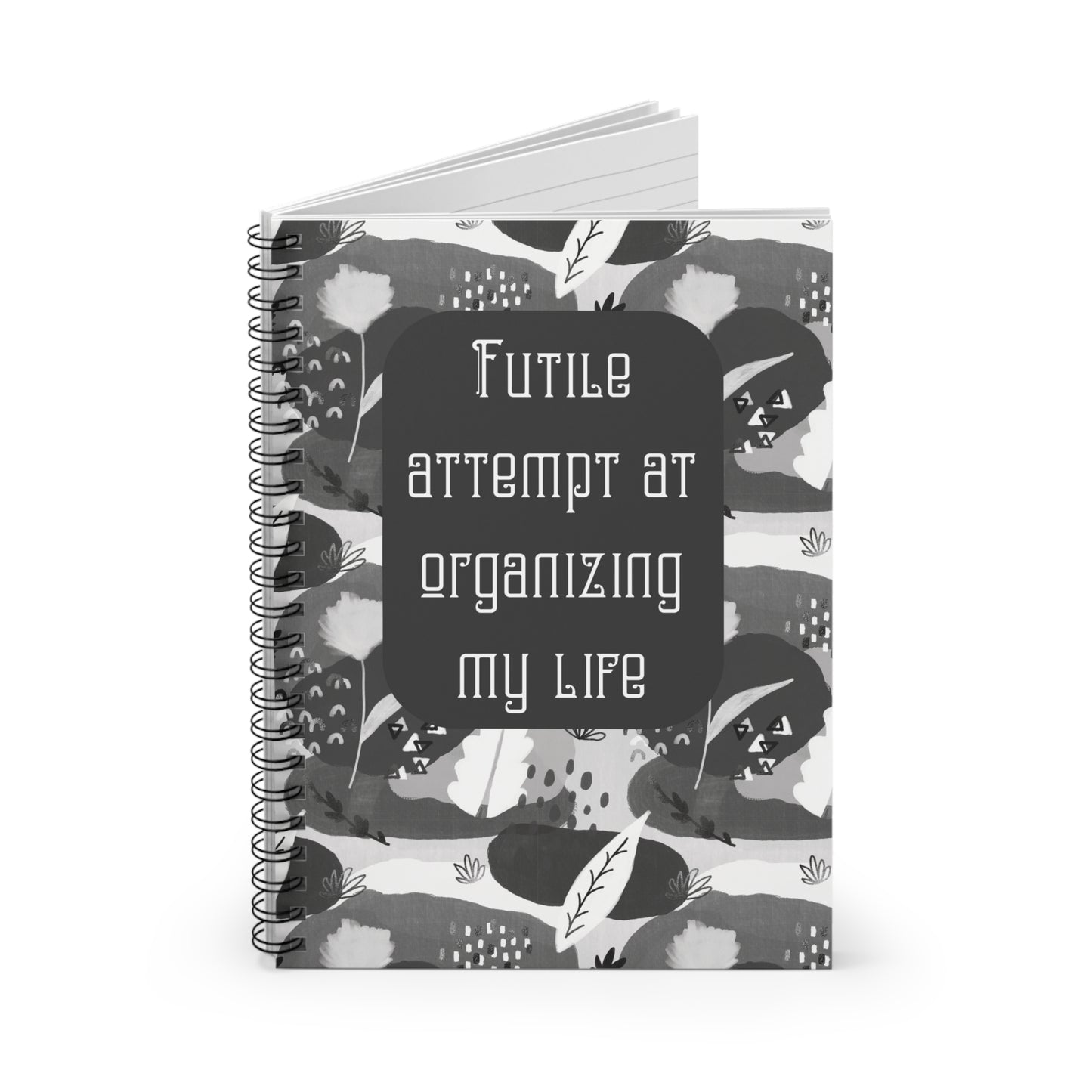 Spiral notebook that says Futile attempt at organizing my life  - Ruled Line